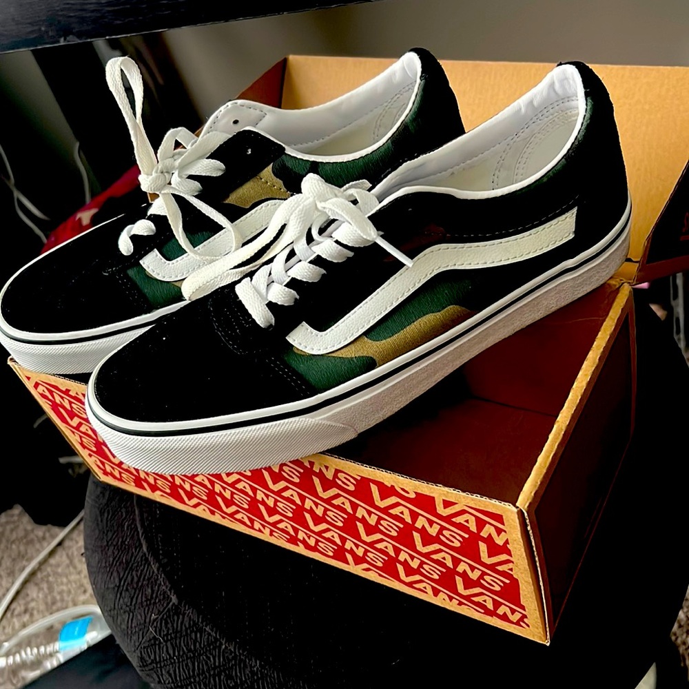 Camo print Vans. Only worn twice. Fair new condition with original box.